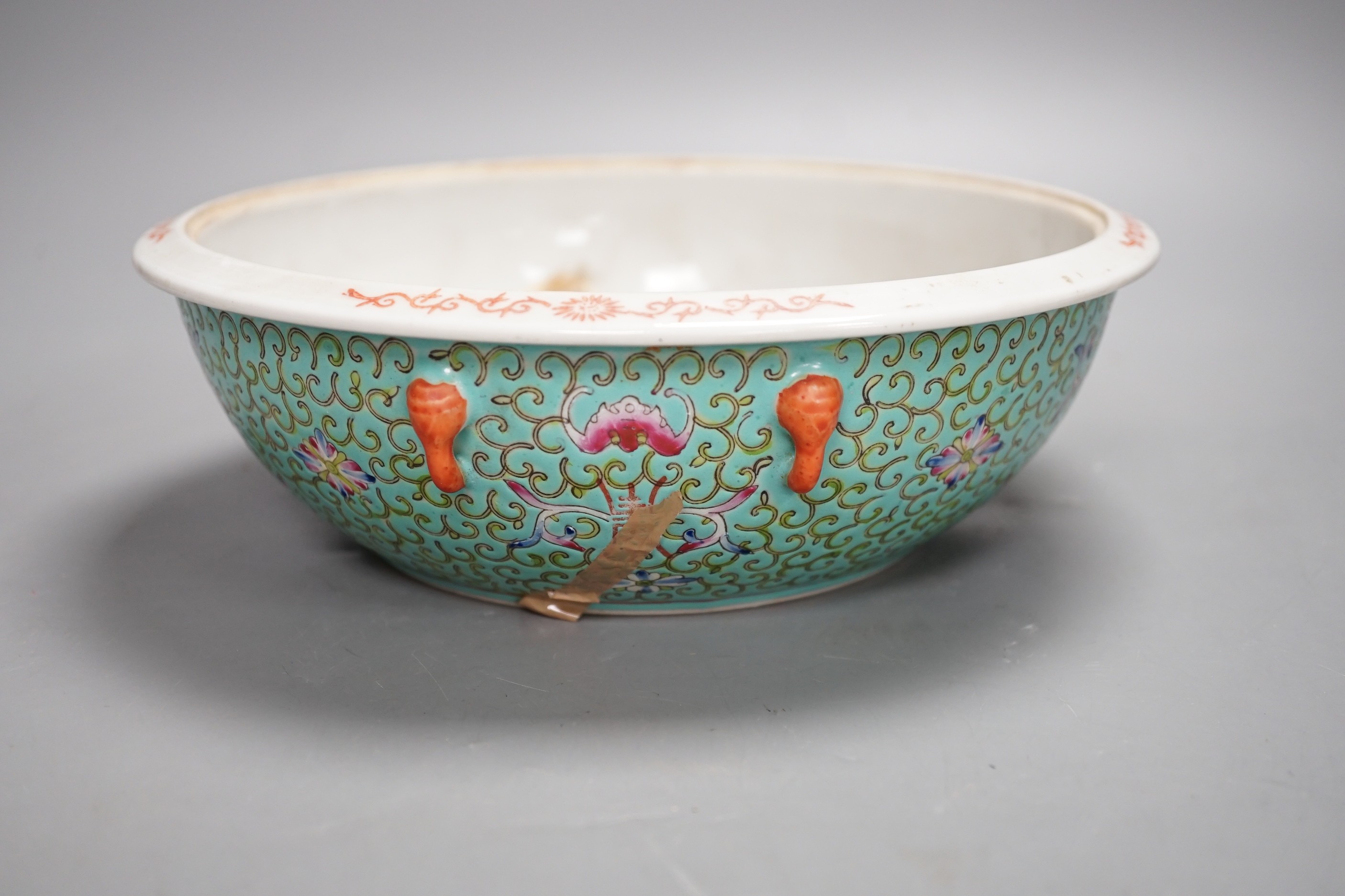 A 20th century Chinese famille rose turquoise ground floral bowl. 23.5cm diameter, lacking cover